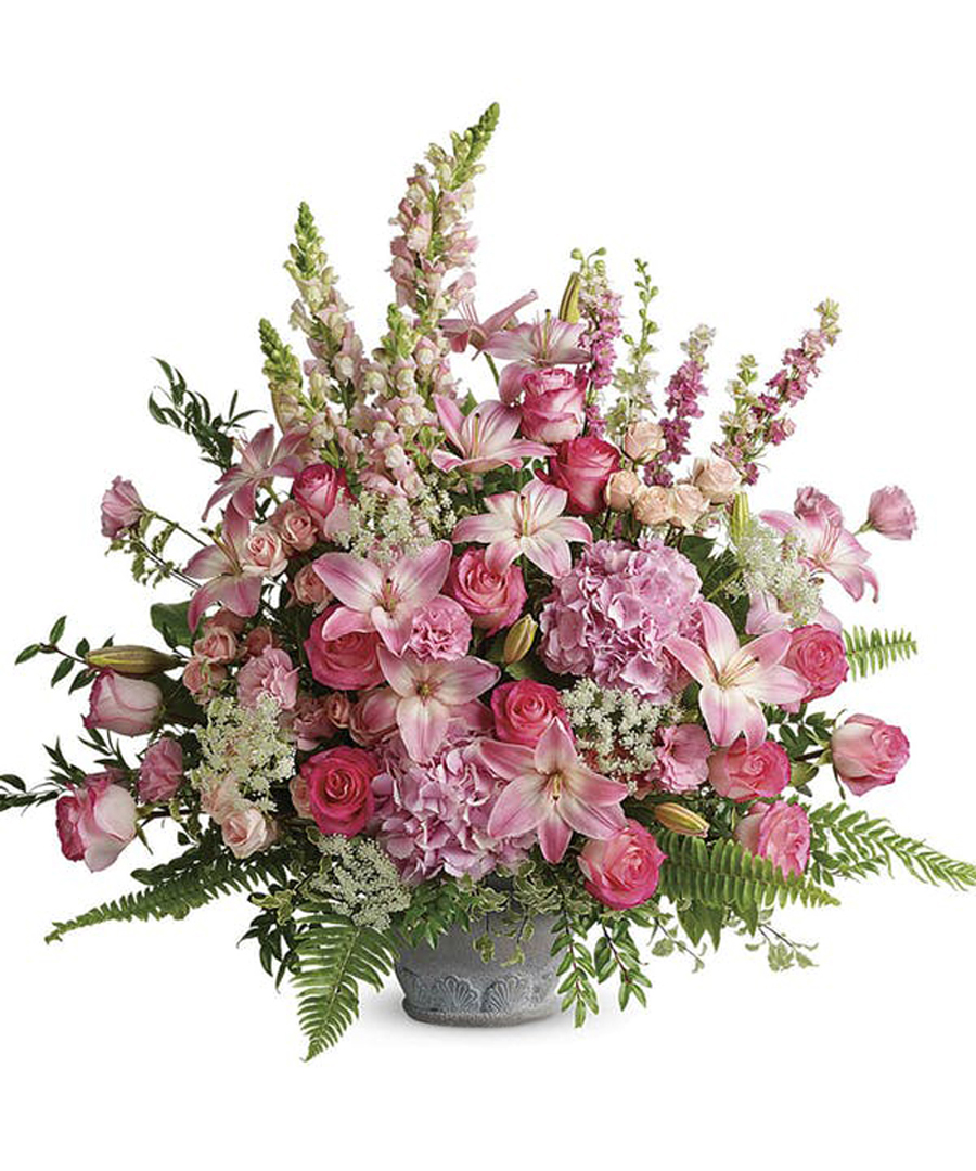 Soft Blush Tribute Deluxe The soft blush tribute features premium roses, lilies, hydrangea and more.