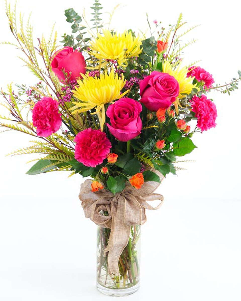 Cali Splash Standard This lush, colorful arrangement features loads of premium flowers and tons of texture.
NOTE: For the Cali Collection: images shown are PERFECT example of the size, colors, style, and presentation of arrangements, but some actual flowers may differ based on the freshest and brightest available product. Additionally, the arrangements are photographed with all flowers facing the camera so you can see what is in them, but are actually designed to be enjoyed from any angle.

