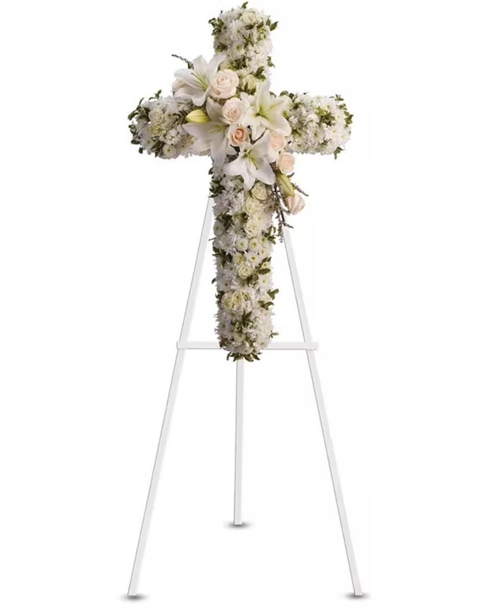 Heavenly Light Standard-18 inch Crème roses, white spray roses, oriental lilies, stock, leptosporum, cushion and button spray chrysanthemums create a cross that is a beautiful way to honor a loved one.