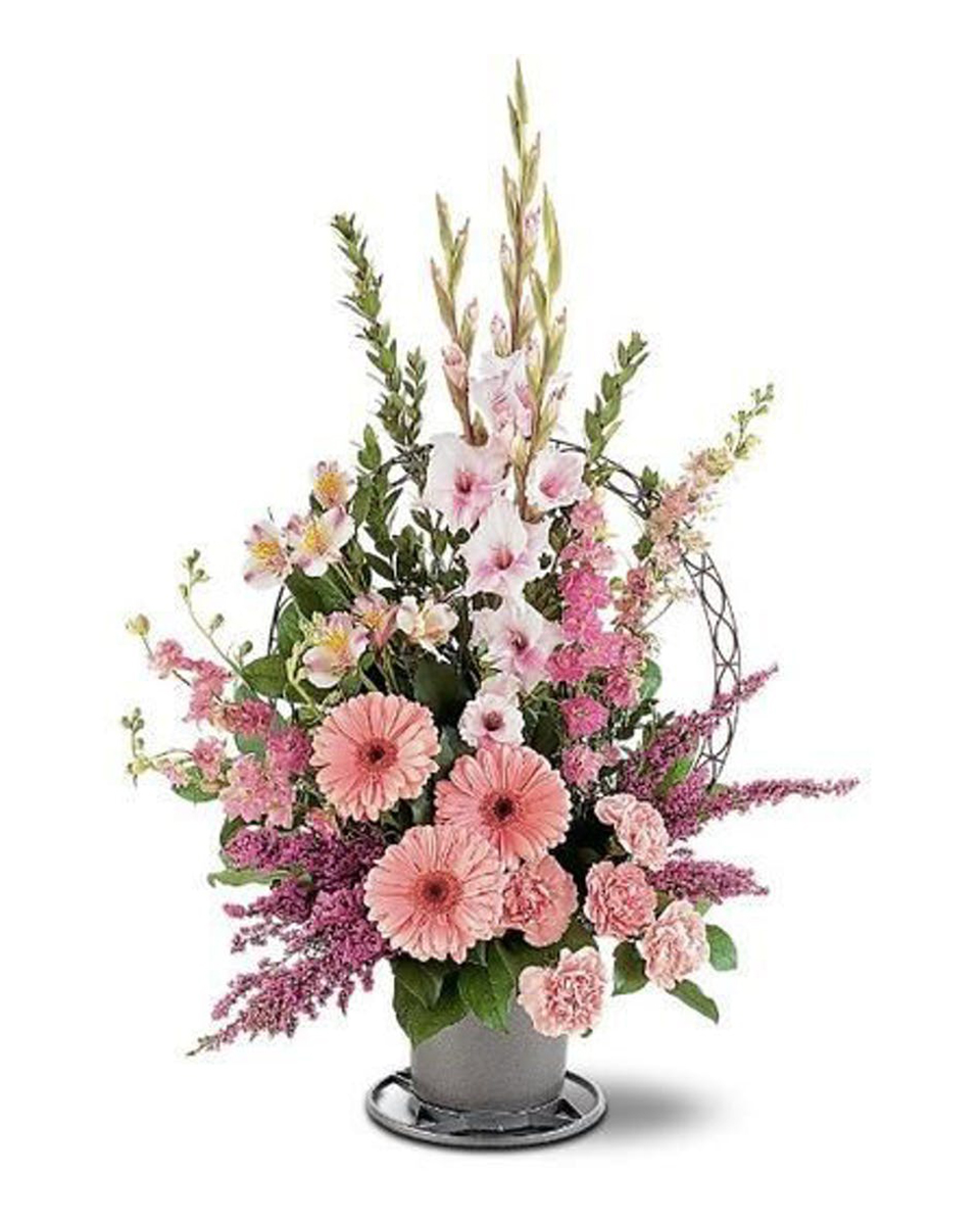 Pink Floral Tribute Standard This beautiful arrangement with its varying tones of pink will send your message of hope out to all at the service.
DELIVERY: Every order is hand-delivered direct to the recipient. These items will be delivered by us locally, or a qualified retail local florist.