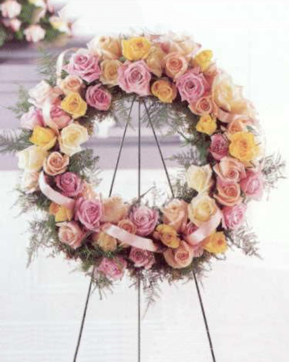 Vibrance Standing Wreath Standard (18 Inch) Roses, roses & more roses. Soft in color, fragrant and just plain special. Suitable for funeral service.
DELIVERY: Every order is hand-delivered direct to the recipient. These items will be delivered by us locally, or a qualified retail local florist.