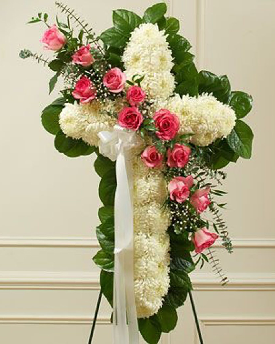 Rosa Cruz Standard (24 Inch) Standing crosses are a beautiful expression of condolence and tribute. Our standing cross has a sash of pink roses, eucalytuts and more. .
DELIVERY: Every order is hand-delivered direct to the recipient. These items will be delivered by us locally, or a qualified retail local florist.