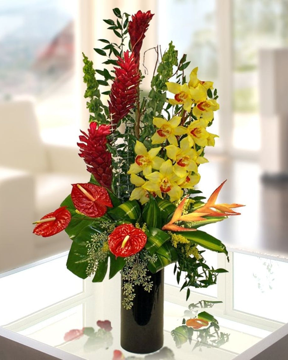 Island Adventure Standard Deliver a week in the tropics! This stunning bouquet is budding with exotic birds of paradise, lush cymbidium orchids and other fresh cut tropical flowers that will make anyone's day special!
DELIVERY: Every order is hand-delivered direct to the recipient. These items will be delivered by us locally, or a qualified retail local florist.