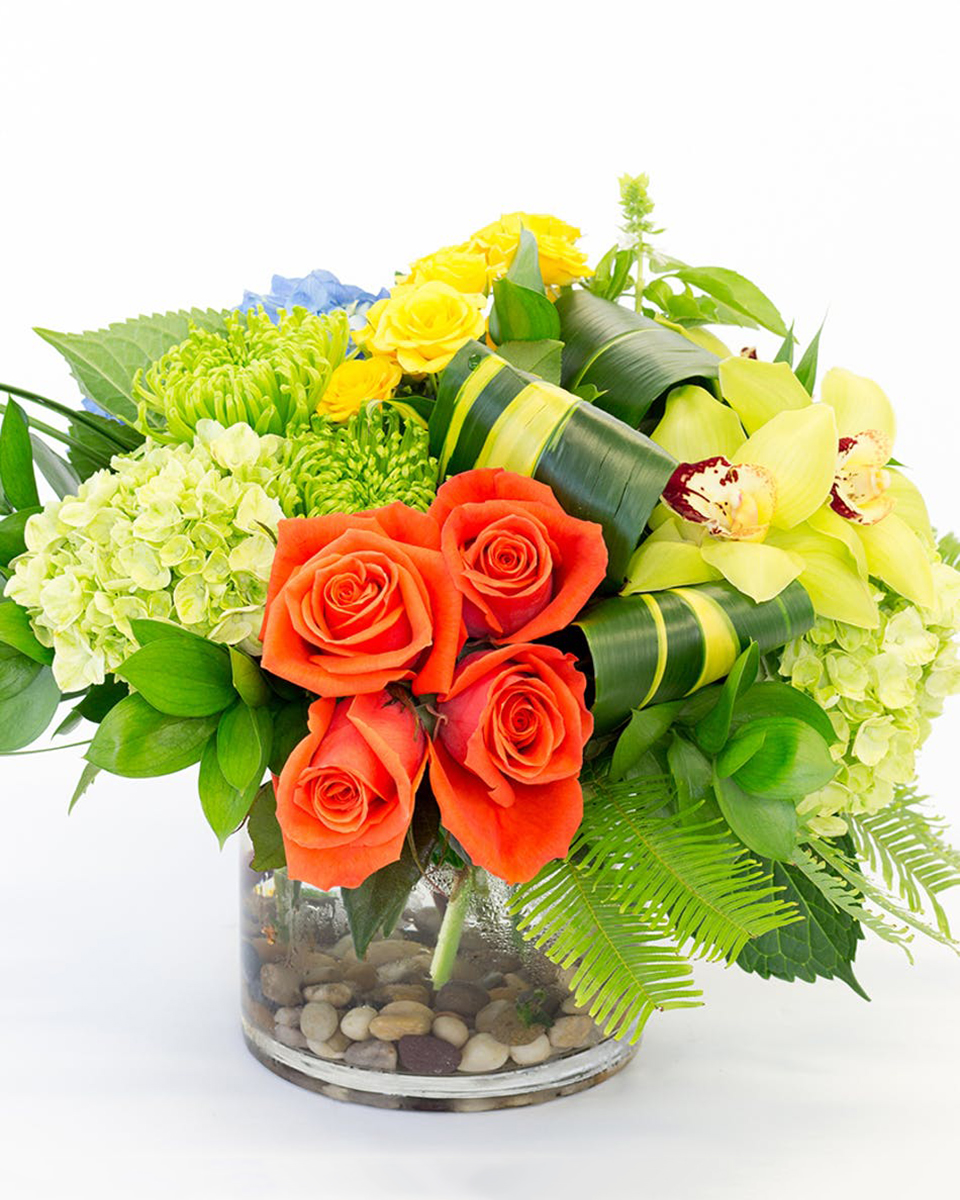 Pacifica Standard Bright cayenne roses add a pop of color to this arrangement also featuring hydrangea, orchids, and other premium flowers and greenery.
DELIVERY: Every order is hand-delivered direct to the recipient. These items will be delivered by us locally, or a qualified retail local florist.