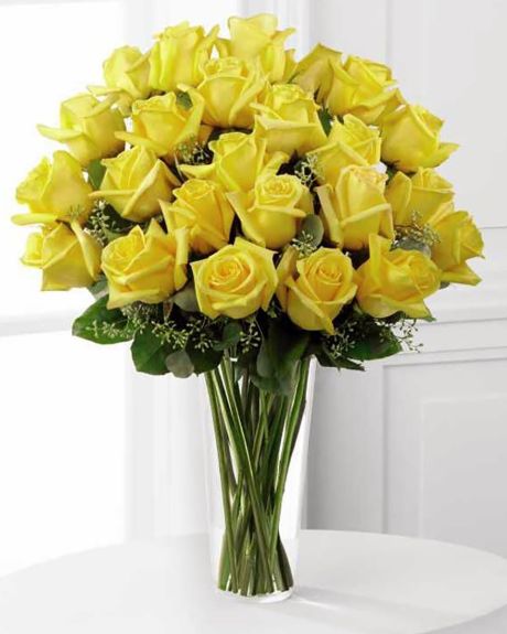 YELLOW ROSES-24 Long Stem Yellow Roses arranged in a Vase with assorted greens and fillers.- YELLOW ROSES

