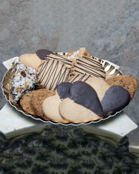 Chocolate is the answer Cookies-Chocolate Dipped Heart Cookies, Chocolate Chip Cookies, Almond Biscotti, Coconut Bars, Chocolate Chip Bars, Walnut Bars, and Chocolate-Ganache filled Butter Cookies come in this tantalizing assortment. Cookies